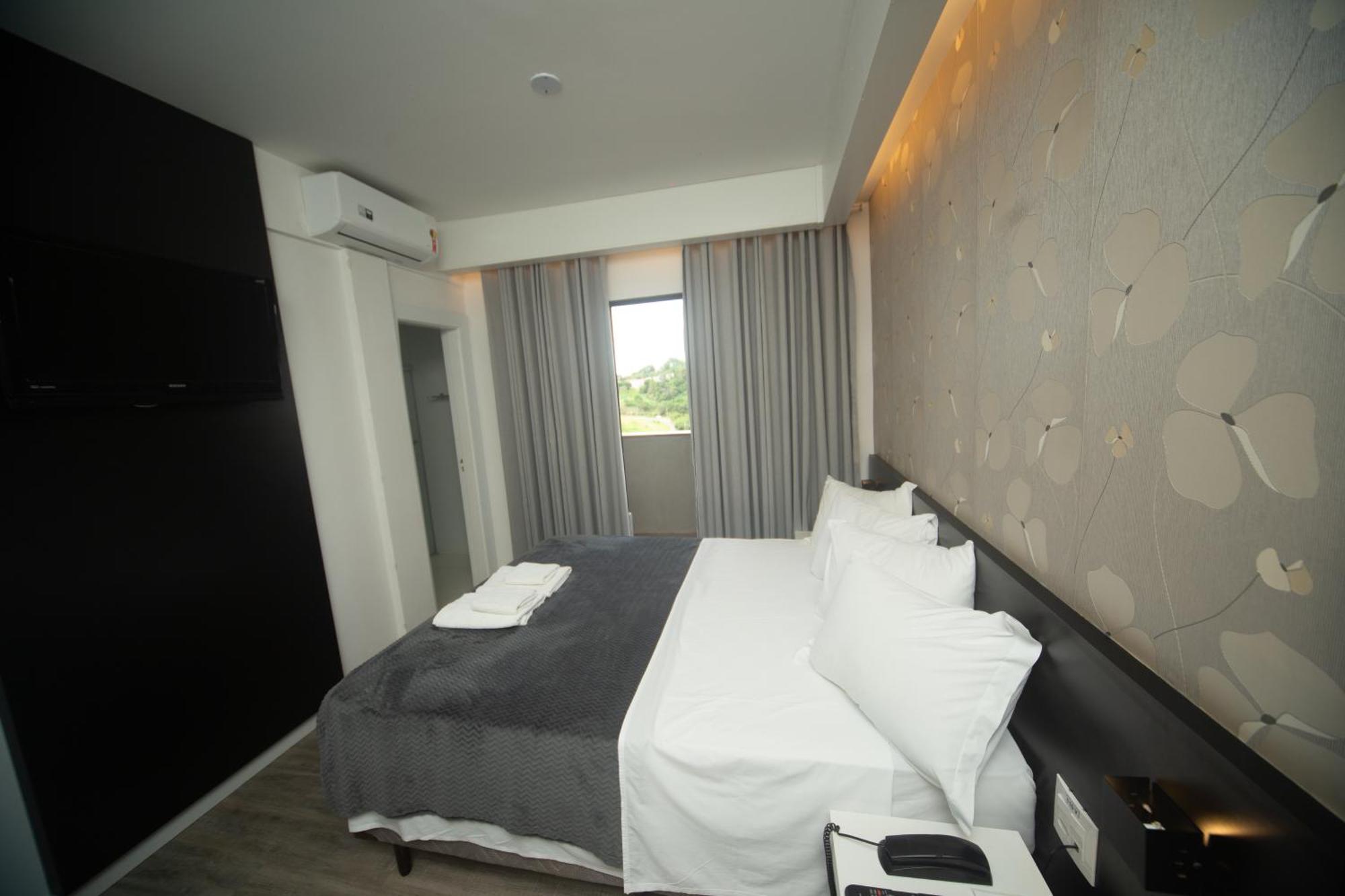 Hotel Cidade Araxa Bagian luar foto